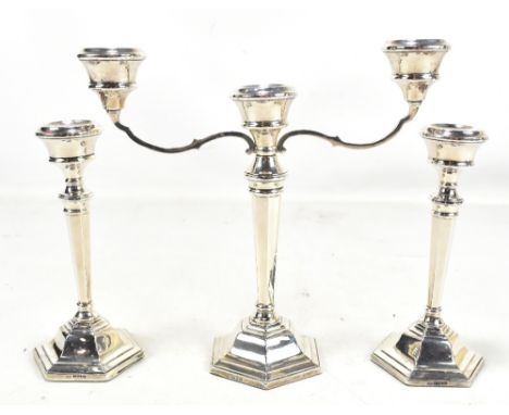 SANDERS &amp; MACKENZIE; an Elizabeth II hallmarked silver three sconce candelabra, Birmingham 1969, height 24cm, also a pair