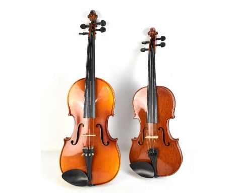 A modern viola with two-piece back fitted in carrying case and a modern cased violin (2).&nbsp;Additional InformationWe are u