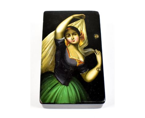 A Russian rectangular papier-mâché snuff box, the lid decorated with a young woman dancing with a veil, 10.25 x 6.25 x 2.5cm.