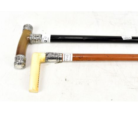 Two late 19th/early 20th century walking canes, the first with ivory handle and malacca shaft bearing white metal collar, len