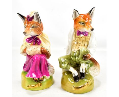 ROYALE STRATFORD; two hand painted porcelain figures, 'Grandfather Fox' and 'Grandmother Fox', with printed marks to base (2)