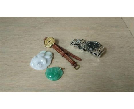 Two Jade pendants, a Herblin watch etc.