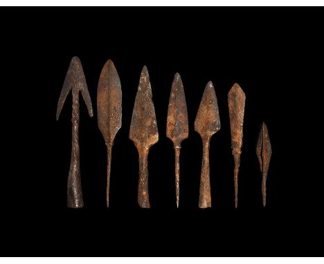 12th-15th century AD. A mixed group of iron arrowheads comprising: one triangular-section, tanged; one leaf-shaped, tanged; o