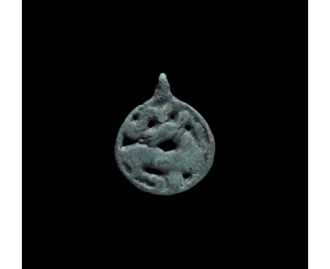 11th-12th century AD. A bronze Scandinavian pendant of Kipplingeberg type (also widespread in the historical Rus region), wit