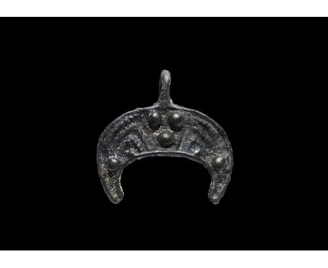 10th-12th century AD. A bronze lunate Scandinavian pendant (also widespread in the historical Rus region), with integral pier