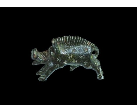 1st century BC-1st century AD. A bronze model boar in animated pose with legs extended, tail looped, crest of bristles to the