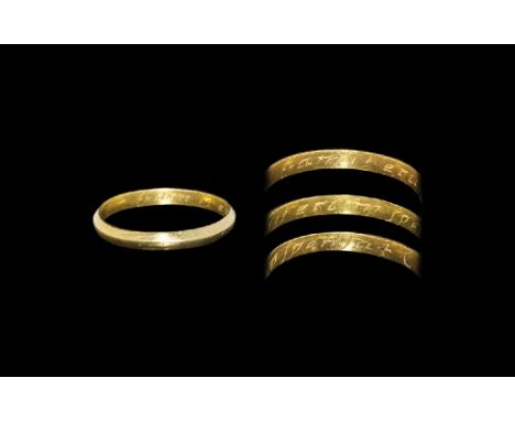 18th century AD. A plain D-section hoop with inscribed text to the inner face in an italic hand iam iterum sponsa F.C. (with 