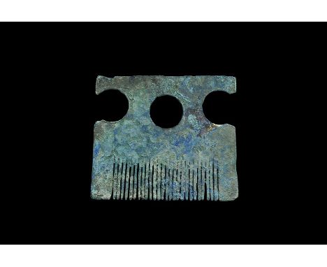 11th-12th century AD. A bronze lentoid-section one-piece comb of Scandinavian type (also widespread in the historical Rus, Up