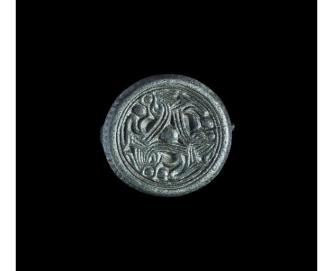 7th century AD. A bronze box brooch with traces of original gilding, discoid in plan with slightly tapering sidewall with a b