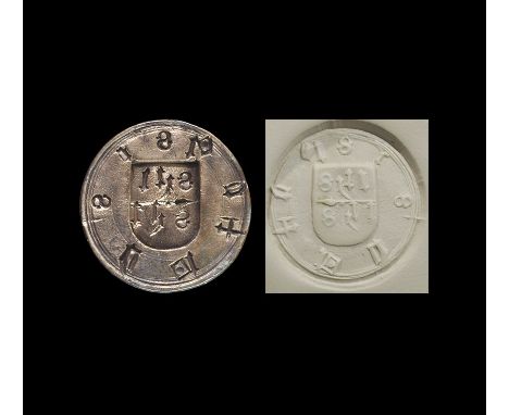 15th-16th century AD. A bronze circular flat seal with attached hinged rib and suspension loop to reverse; with intaglio desi