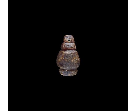 5th century BC. A carved amber model animal head with bridle to the muzzle. See Causey, F. Ancient and Carved Amber in the J.