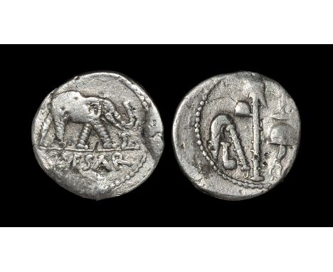 49-48 BC. Obv: CAESAR legend in exergue, elephant right, trampling on serpent. Rev: sacrificial implements: simpulum, sprinkl