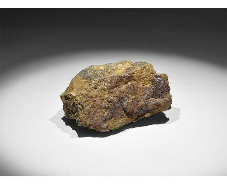 . A specimen of cassiterite in matrix, from Alaska, USA, with a paint label reading: ‘Cassiterite, Lost R(iver), Seward Penin
