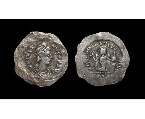 565-578 AD. Unofficially struck from the dies for a gold tremissis (from stolen dies?), Constantinople mint. Obv: DN IVSTI-NV