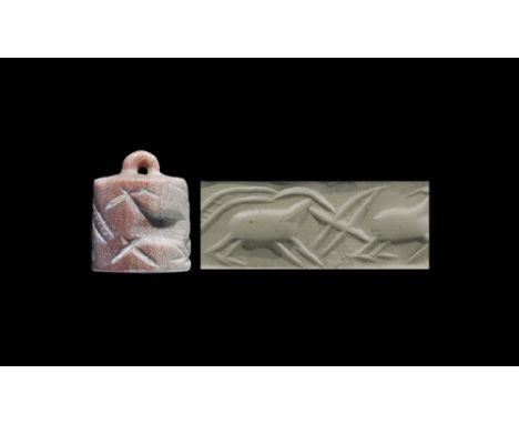 Circa 3000 BC. A carved marble seal with frieze of animals; accompanied by an old scholarly note, typed and signed by W.G. La