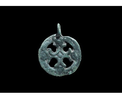 10th-12th century AD. A bronze Scandinavian type pendant, with pierced lug above, openwork cross fleury with beaded border.  
