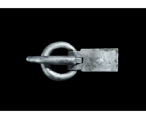 5th century AD. A silver buckle assemblage comprising a round-section loop and rectangular plaque with strap to the reverse a