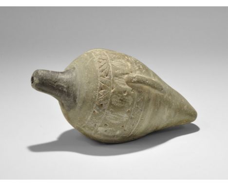 9th-11th century AD. A hollow ceramic vessel with domed top and conical base extending to a flat-section finial, intended to 