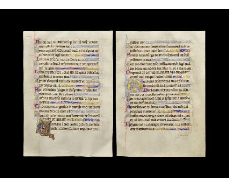 1165-1223 AD. A single vellum leaf from a manuscript psalter with blocks of blackletter text, versals in blue and red ink and