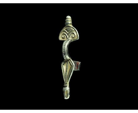 Later 5th-6th century AD. A silver-gilt bow brooch comprising a D-shaped headplate with palmette detail, ribbed knop above, d