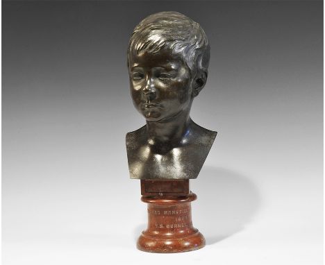 Dated 1884. A finely modelled bronze bust sculpture of a boy on a red marble base inscribed 'Thomas Mansfield Guthrie / 1884 