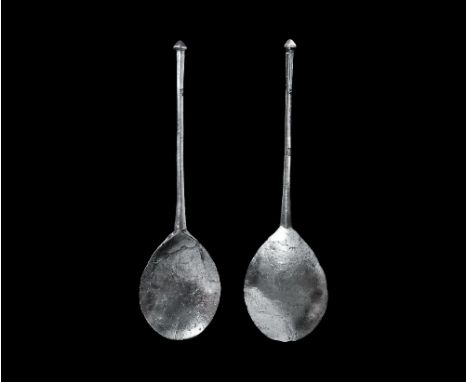 14th century AD. A silver diamond-section handle with hexagonal diamond-point finial, broad piriform bowl with thickened junc