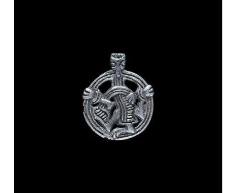 Late 10th-early 11th century AD. A silver Scandinavian pendant of Riddarholmen type (also widespread in the historical Rus re
