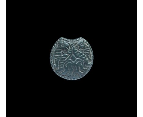 11th-12th century AD. A D-shaped Scandinavian type die (also widespread in the historical Rus region), with radiating lobes t