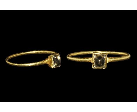 14th-15th century AD. A delicate round-section hoop with piecrust bezel and inset natural octahedral diamond with natural gra