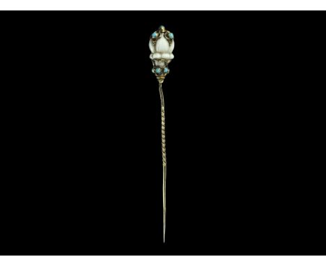 19th century AD. A square-section tapering gold shank with twisted median segment, white ceramic floret with gold openwork pa