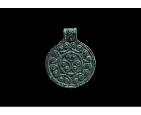 10th century AD. A bronze Scandinavian type pendant (also widespread in the historical Rus region), with concentric bands of 