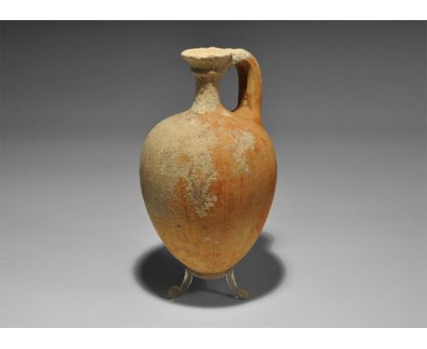 5th-3rd century BC. A ceramic amphora with double-strap handle, waisted neck, conical mouth.    232 grams, 15.5cm (6"). Engli