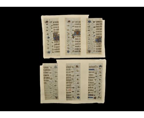 15th century AD. A group of three vellum manuscript page segments mounted on an art paper frame, each with Middle French text