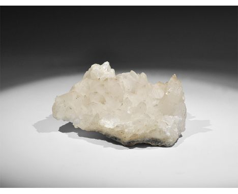 . A sheet of scalenohedral white calcite crystals exhibiting parallel, radiating, and over growths, in old white card tray, r