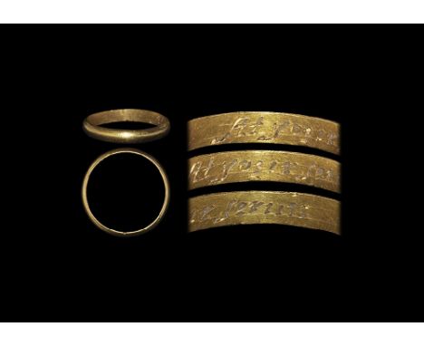 18th century AD. A D-section gold hoop with inscribed text to the inner face in an italic hand 'At your serviic', with k mark