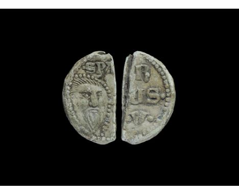 1417-1431 AD. A lead papal bulla seal with to one face bearded face beneath 'SPA' above and pelletted border, to the other fa