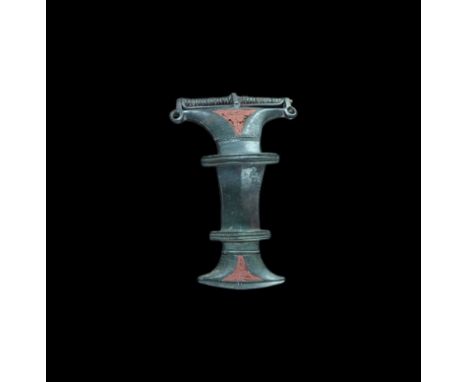 3rd century AD. A large bronze Baltic bow brooch of the 'ladder brooch' type of ogee profile; the headplate trapezoidal with 