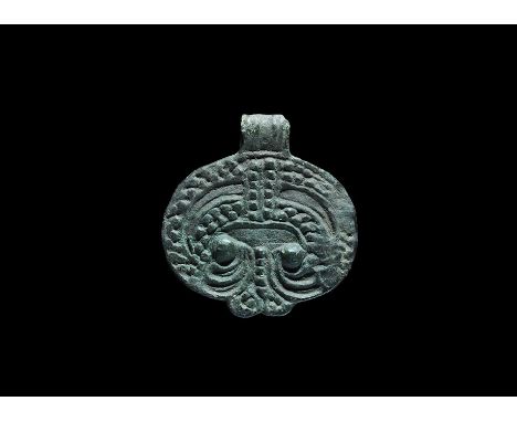 9th-12th century AD. A bronze Scandinavian type pendant (also widespread in the historical Rus region), with false loop, band