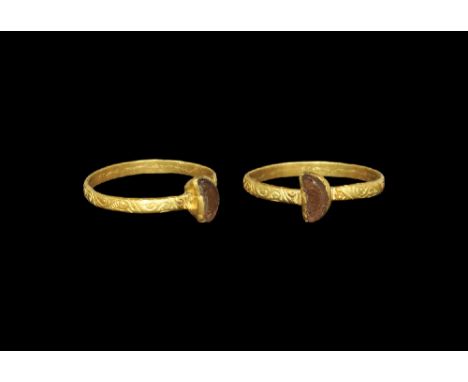 14th-15th century AD. A flat-section hoop with scrolled foliage ornament, crescentic pie-dish bezel with amethyst insert. Cf.