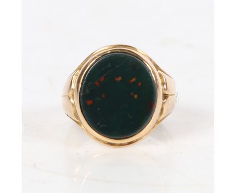 A 15ct yellow gold Victorian bloodstone signet ring, the oval table measures 15 x 13mm. Hallmarked Birmingham 1876. Finger si