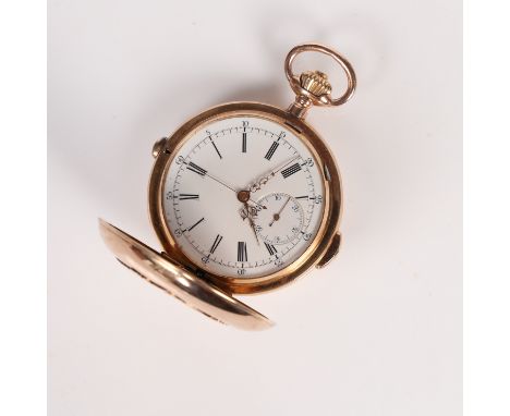 the case with raised monogram, the white enamel dial with Roman numerals, outer minutes track and subsidiary seconds dial at 