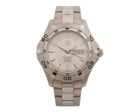 Model no WAF2011, circa 2013, the signed silver dial with baton markers, day/date aperture at the three o'clock position, out
