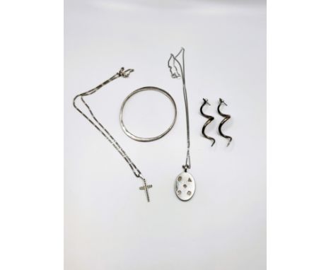 A silver cross and a figaro silver chain 44cm, a pair of silver spiral long drop earrings 6cm, a Millennium silver oval ingot