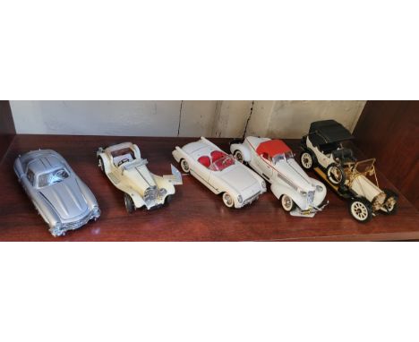 Five Franklin Mint 1:24 scale cars including Mercedes-Benz 300SL. (5)