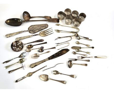 A collection of silver and silver plate including six matched silver napkin rings marked 800 with scroll design, an elector p