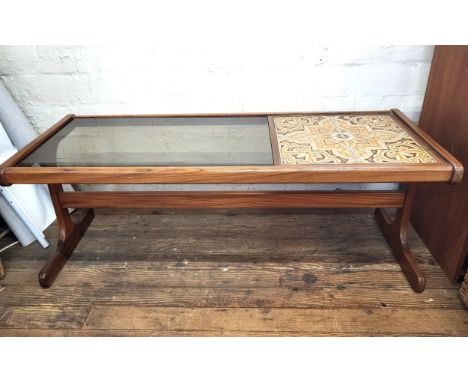 A 1970's G Plan rectangular coffee table, part glass part ceramic top. 45cm x 121cm x 50cm.