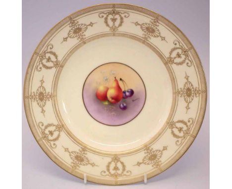 Royal Worcester plate signed Townsend   painted with fruit within a gilded pale yellow ground, puce printed mark and 1932 dat