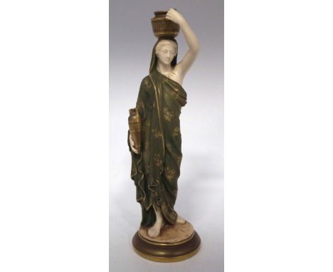 Royal Worcester figure of a female water carrier  modelled wearing a green and gilt tunic, green printed marks and 1911 date 