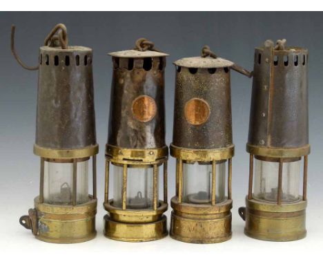 Three Richard Johnson Clapham Morris Ltd, Manchester, steel sleeved safety lamps, one named on the top, all named on the bras