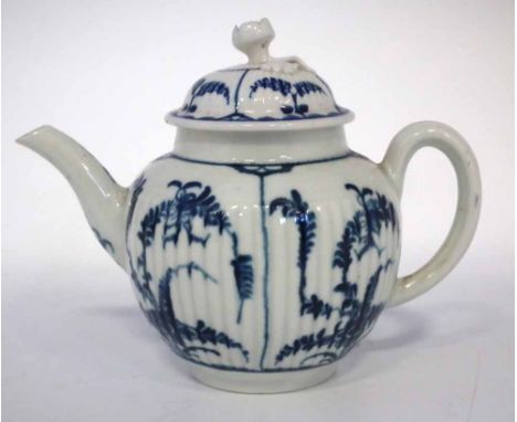 Worcester teapot circa 1770   with ribbed body painted with Immortelle pattern in underglaze blue, crescent mark to base, (2)
